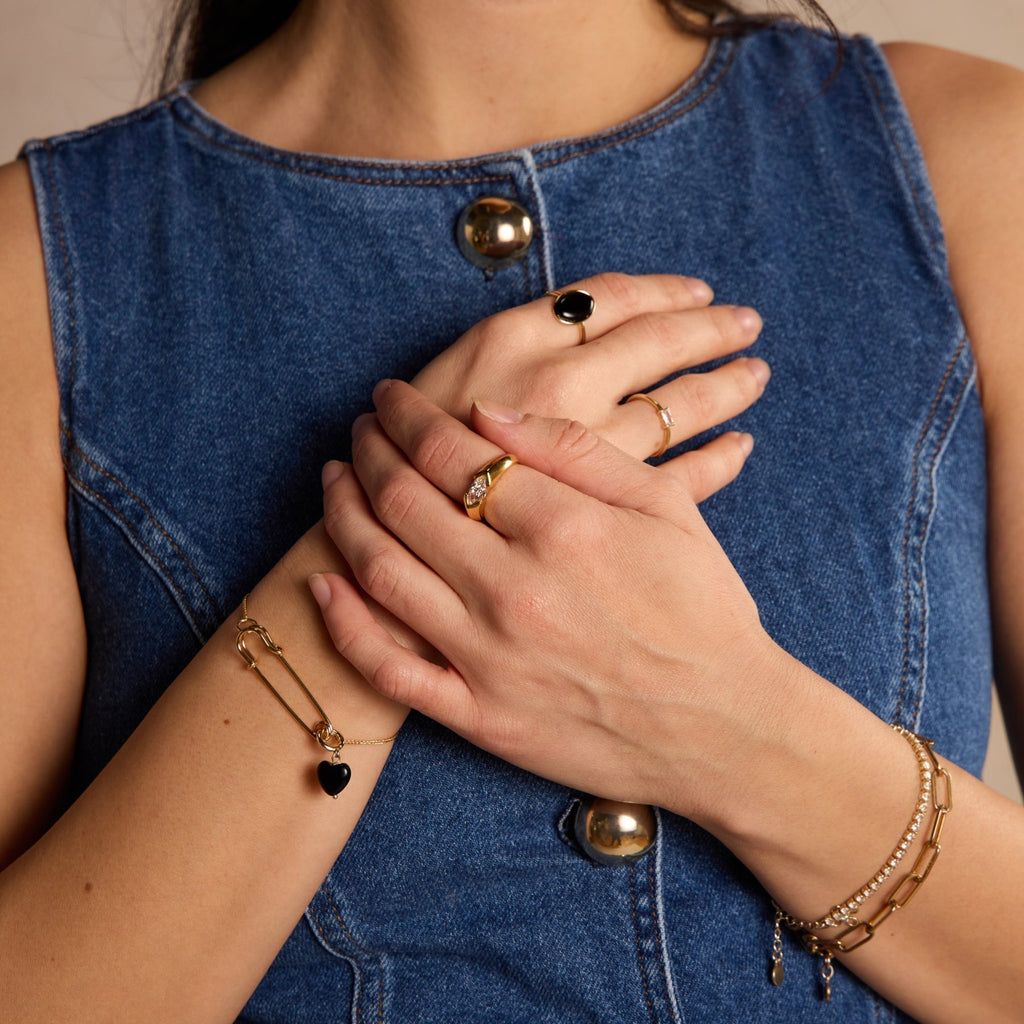 Black Oval Stone Ring in Gold