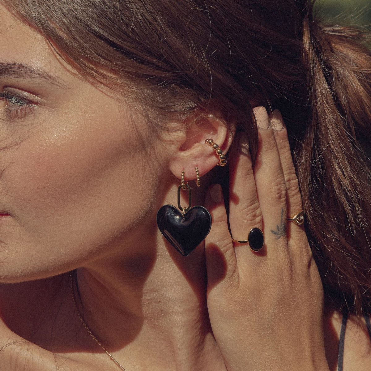 Black Oval Stone Ring in Gold