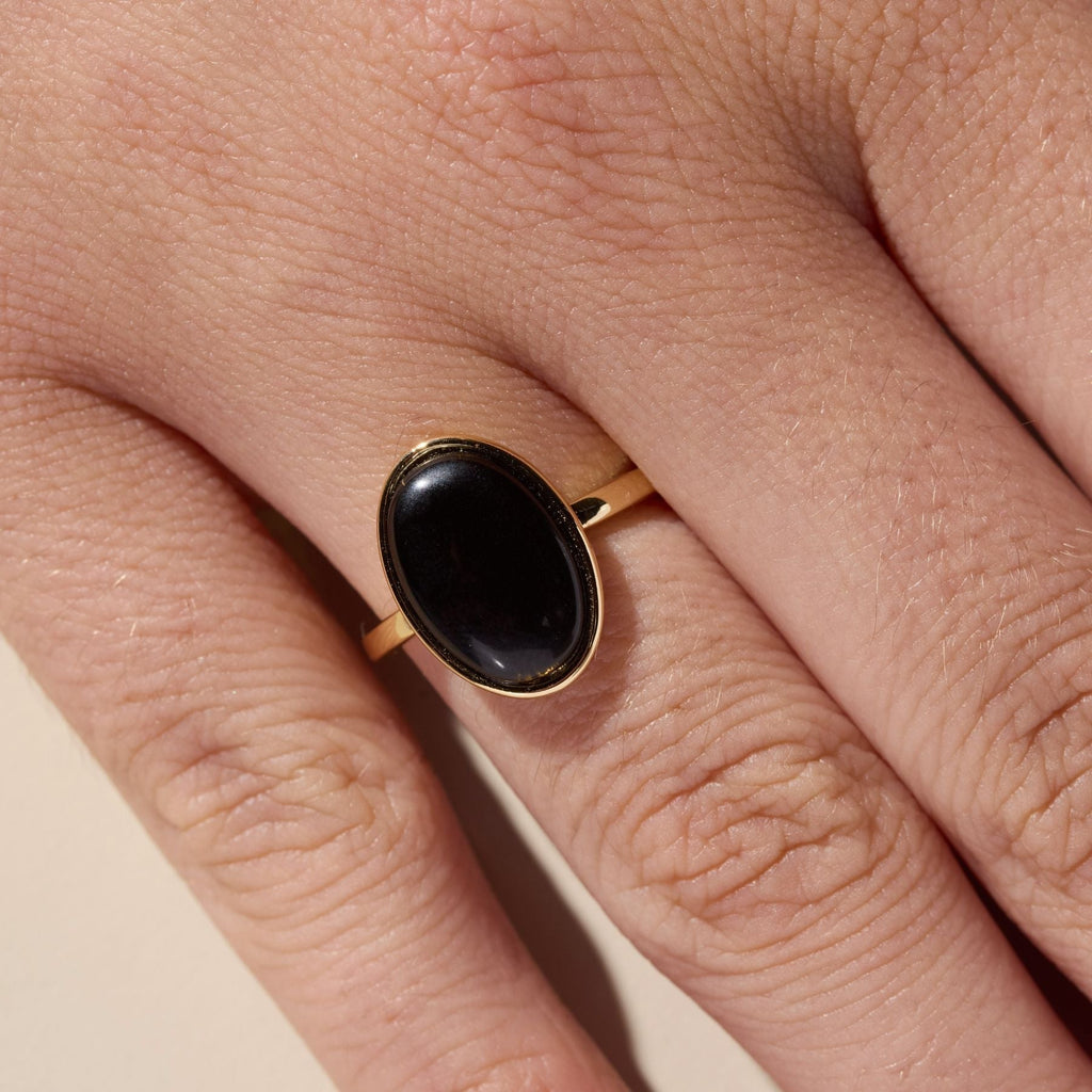 Black Oval Stone Ring in Gold